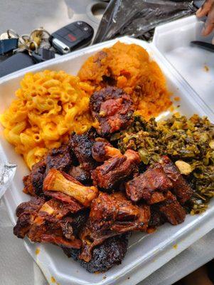 Dr Pepper oxtails, Mac and cheese, collard greens with yams. This is called THE SOUL FOOD BOX $30