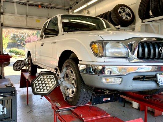 Alignment being performed on this Toyota.