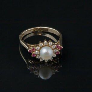 Pearl ring with halo of diamonds and accented with rubies/