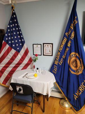 A memorial table for fellow Mia veterans... They said it was removable but we like it... so it stayed