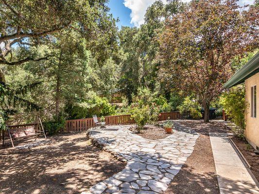 Gorgeous back yard with beautiful oak trees in Atascadero.