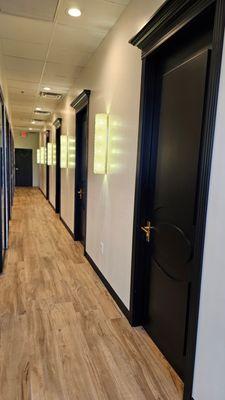 Our private Service rooms with custom built solid wood doors with soundproofing added at the base.