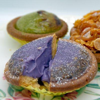 Front: Ube Baked Cheese Tart (take-out)
 Back: Matcha Baked Cheese Tart