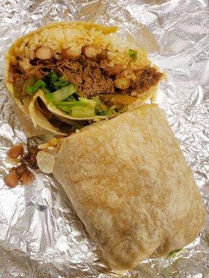 Barbacoa Beef Burrito w Lettuce, Peppers, Onions, Cilantro, Rice & Beans. Rib Stickin' YUMMMMMMERS!!