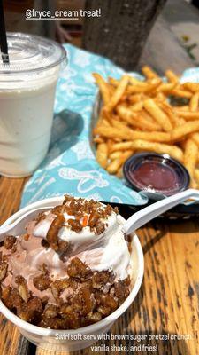 This is a vanilla shake, swirl soft serv with brown sugar pretzel crunch and a basket of fries