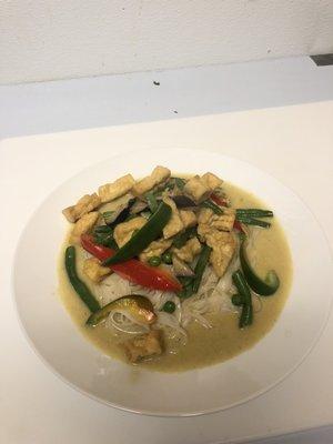 Green curry tofu over the rice noodles lunch