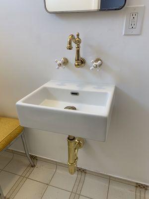 New wall mounted sink and faucet