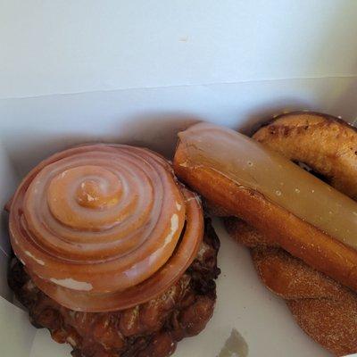 A delicious half dozen with donuts, longjohns, apple fritters and cinnamon rolls!