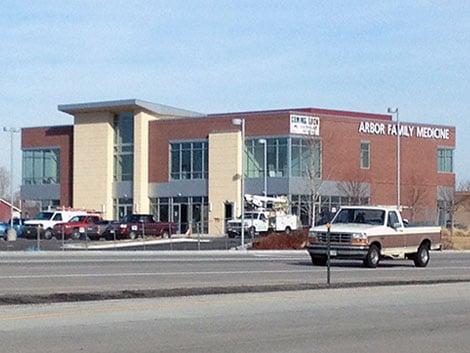 Between Starbucks & Wells Fargo, it's a new building that was built & finished ate 2012