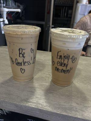 plain latte with sugar-free hazulnut syrup (left) and seasonal drink, hippie hazelnut (right)