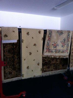 Oriental rugs on the drying rack