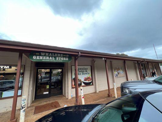 The store is next to the Anahola post office