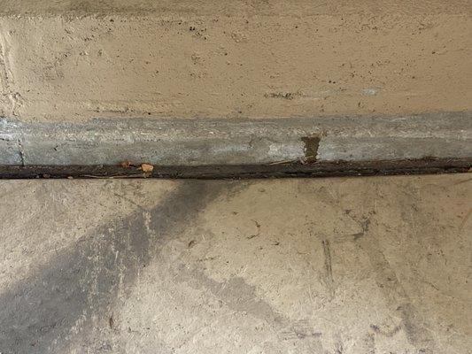 Notice the almost 5 inches of exposed concrete after the floor had sunk.