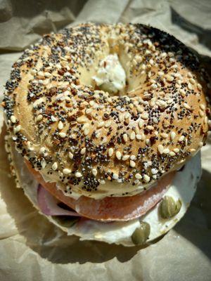 Everything Bagel with Salmon Schmear, added tomato, capers and onion