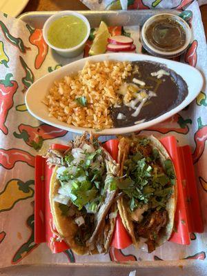 Yelp special - carnitas/pastor street tacos with rice and beans