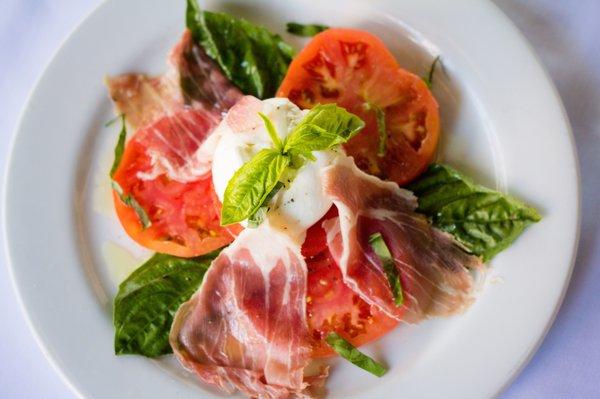 -Mozzarella di Burrata con Prosciutto- Heirloom tomatoes, Italian basil, Fresh Burrata mozzarella cheese, Parma Prosciutto & EVOO