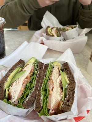 Tuna with avocado and pepper jack on pumpernickel bread. I think it's called Hank's Favorite Sandwich.