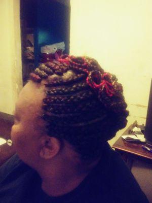 Updo scalp braids with frenchroll and pincurls