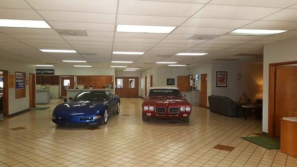 Heritage Body and Frame - Austin,  lobby with our showroom vehicles