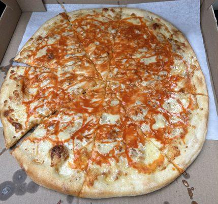 Chicken Buffalo Pizza - medium. Dough was a bit chewy. Hot sauce had a lot of kick. Was oily/greasy and buttery.