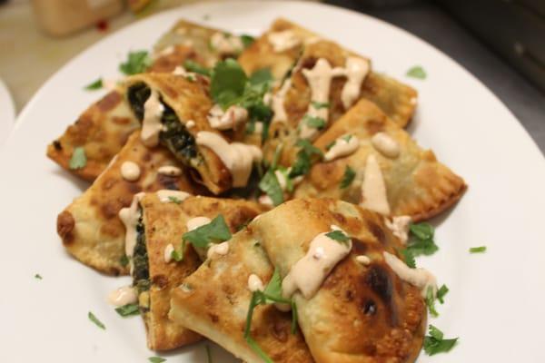 Spinach, ricotta and Jalapeno empanadas with chipotle crema.