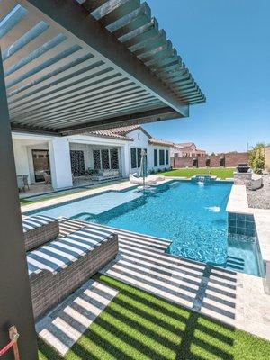 Cantilevered pergola with rain waterfall