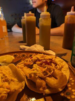 Fish tacos. Crispy fried fish topped with smokey, creamy slaw. Very good.