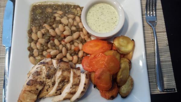 Grilled chicken with roasted root vegetables, and lentil & bean ragout.