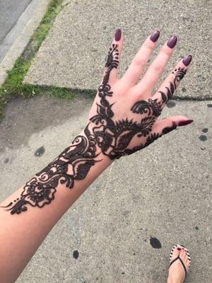 Love my henna tattoo!! Not sure who it was done by but she did a great job. Not overpriced, good quality henna paste, and gorgeous design.