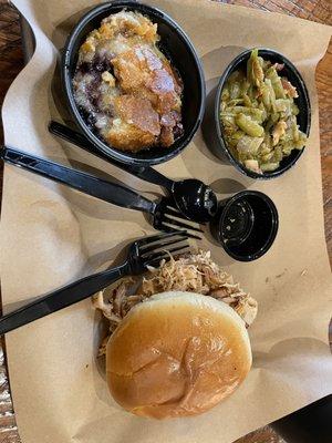 Pulled chicken sandwich, green beans, blueberry cobbler, and a medium sized drink ~$17