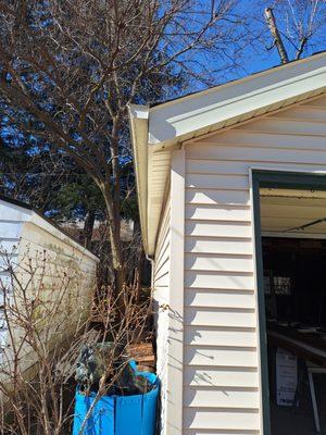 The renewed garage with fascia and soffits