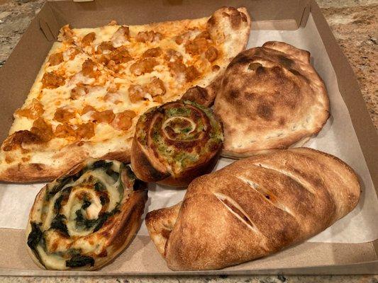 Magic Bag from Too Good To Go app: 2 pinwheels, chicken parm roll, cheese calzone, 2 Buffalo chicken slices. $6