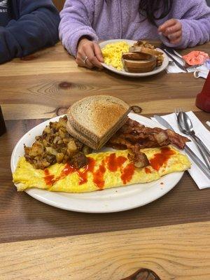 cheese omelette with home fries and bacon