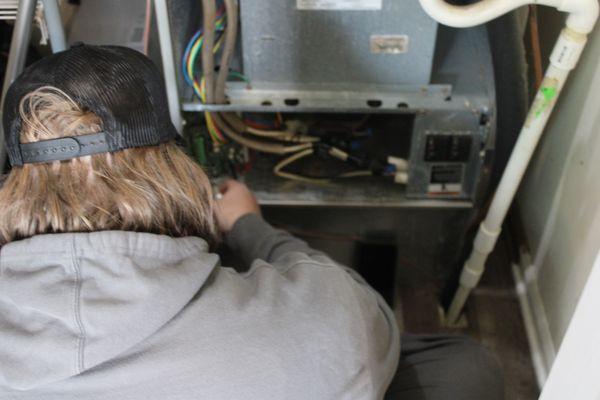 Technician working on Furnace maintenance