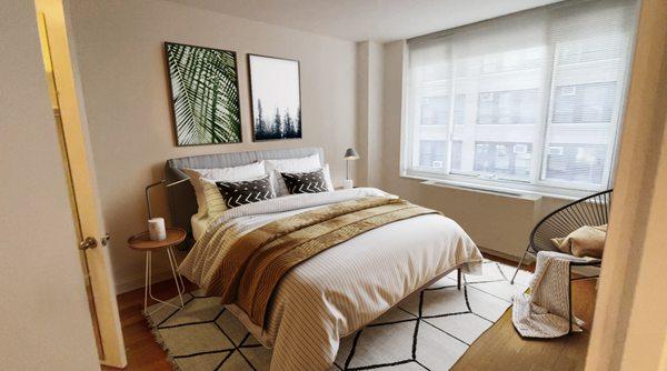 A bedroom in a luxury NYC apartment at Emerald Green in Midtown West Manhattan