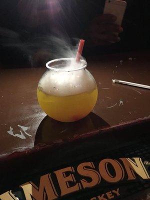 Add dry ice to any cocktails , punch bowl or fish bowl !