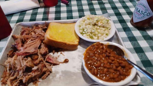 Pulled Pork Plate 8oz., Baked beans, Carolina Slaw (vinegar-based).