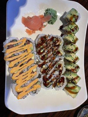 Dragon roll, eel and cucumber roll, and spicy tuna roll