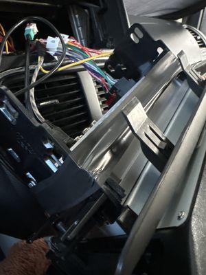 In proper fitting dash kit wrapped with electrical tape