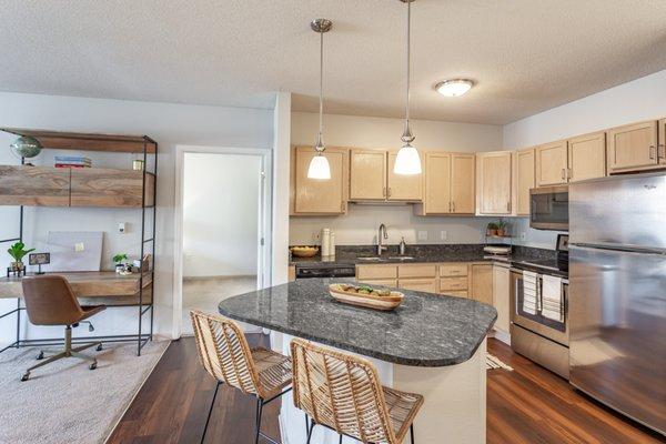 Eat-in-kitchen with Stainless Steel Appliances and Granite Countertops