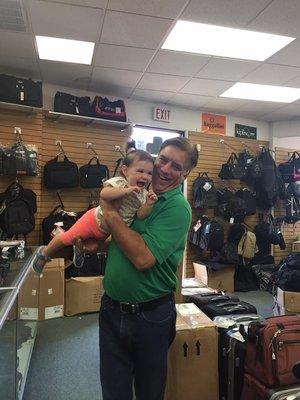 A family business - the owner Gregg Markin and his granddaughter at Andy's Luggage in Wantagh