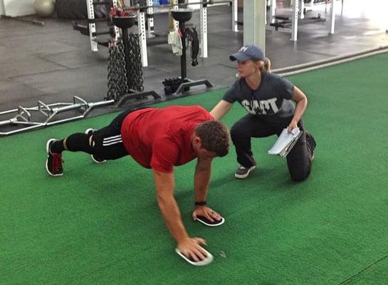 Professional volleyball player Hudson Bates getting his form dialed in with Coach Walls.