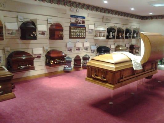 Large Display room with several Wood and Metal Caskets to choose from.