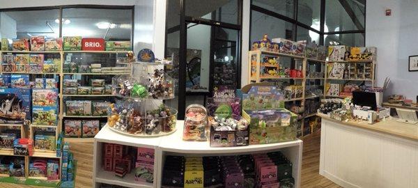 Panoramic view of our lower level which includes our Playmobil, BRIO, and cars/trucks section.