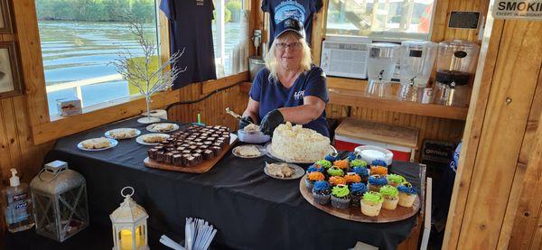 Peggy serving an Awesome Italian Creme Cake