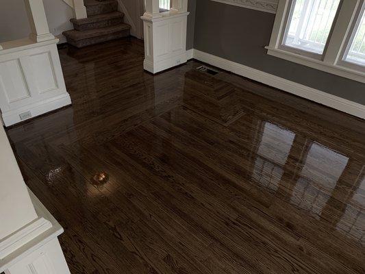 100 years old floor brought back to glory. Red oak hardwood stained Jacobean, oil base finish ( shiny because is wet, dries satin)