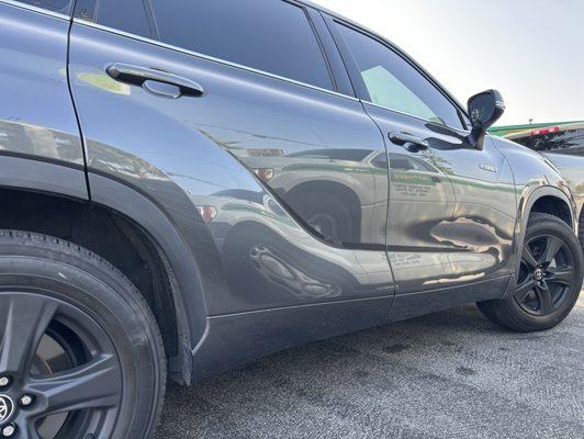 Stock rims painted black on 2021 Toyota Highlander Hybrid