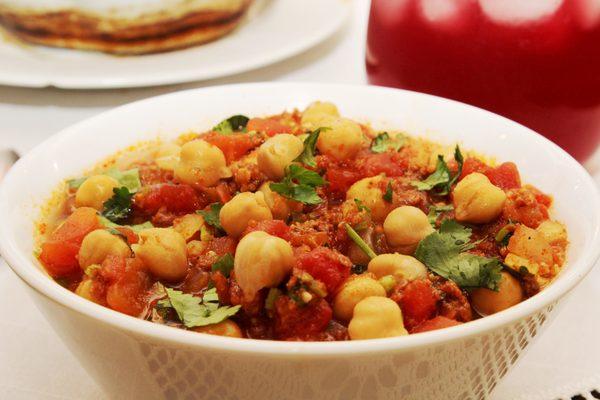 Garbanzos- Chick Peas with diced tomatoes, cilantro, and spices. Great as side dish, also sometimes eaten as a soup.