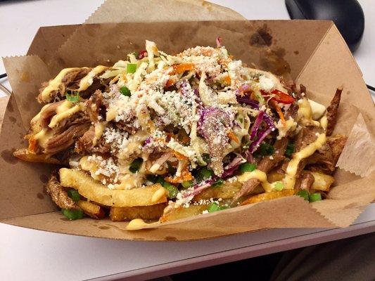 Southern Style Poutine is a beautiful combination of colors and flavors. Haven't had a better comfort meal from any other food truck