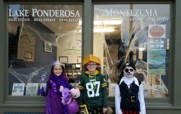 Supporting Montezuma is what AE Realty does very well. Here we're handing out candy to kids on Halloween!